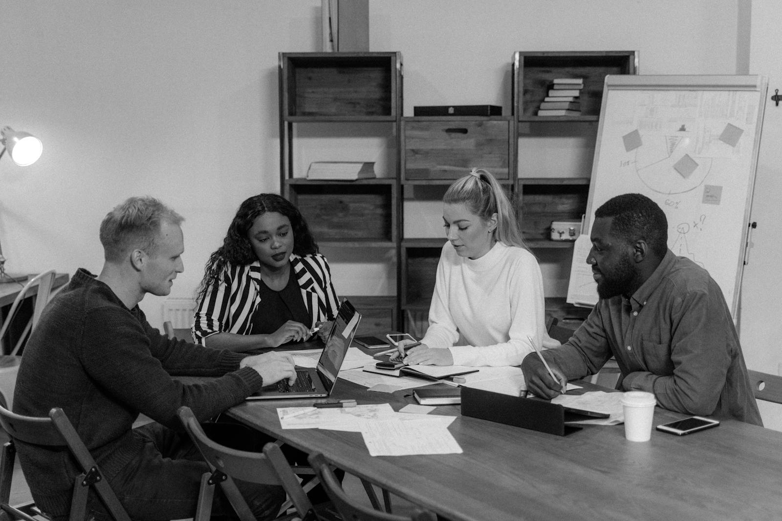 Monochrome Photo of Colleagues having Meeting