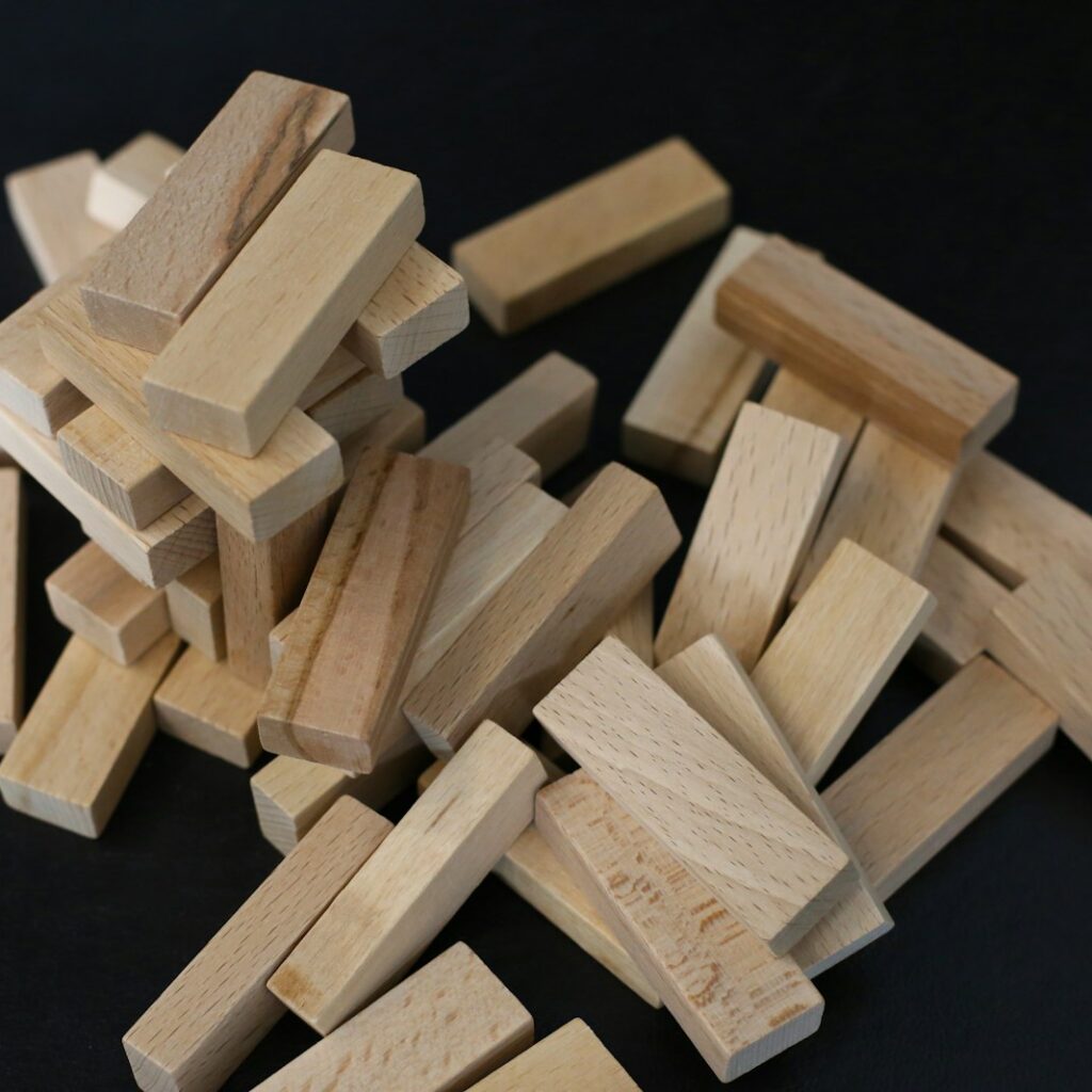 brown wooden blocks on black surface