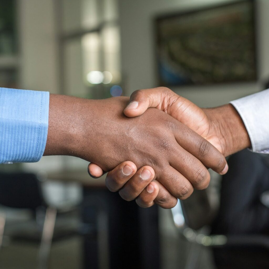 two people shaking hands